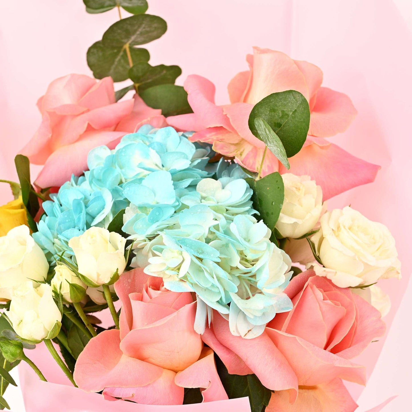 Close-up of pastel roses, hydrangea and chrysanthemums in the birthday bouquet