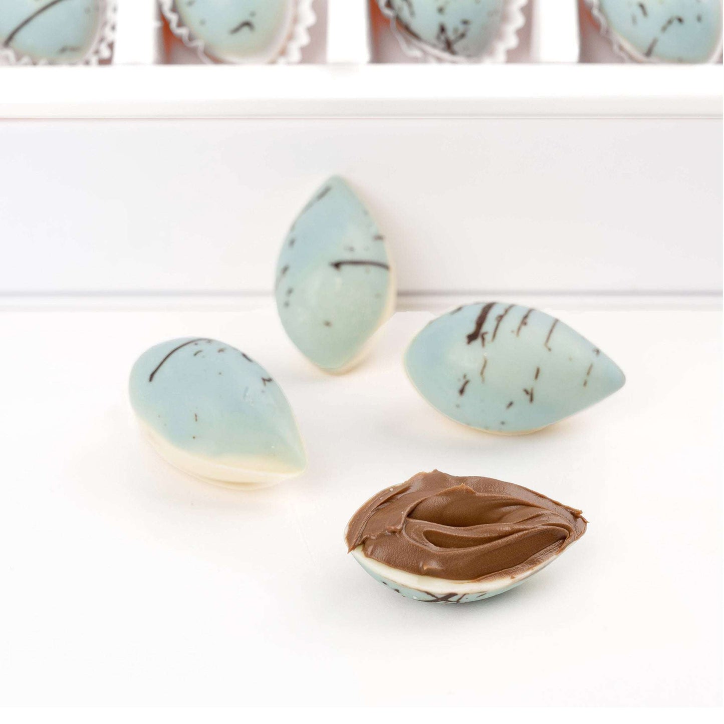 Close-up of blue decorated chocolates from the Blue Serenity apology gift