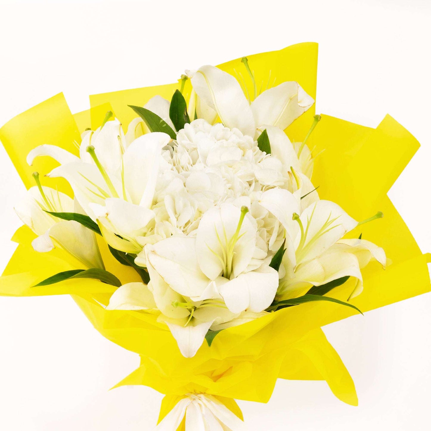 Close-up of white lilies, hydrangea and chrysanthemums in the thank you bouquet