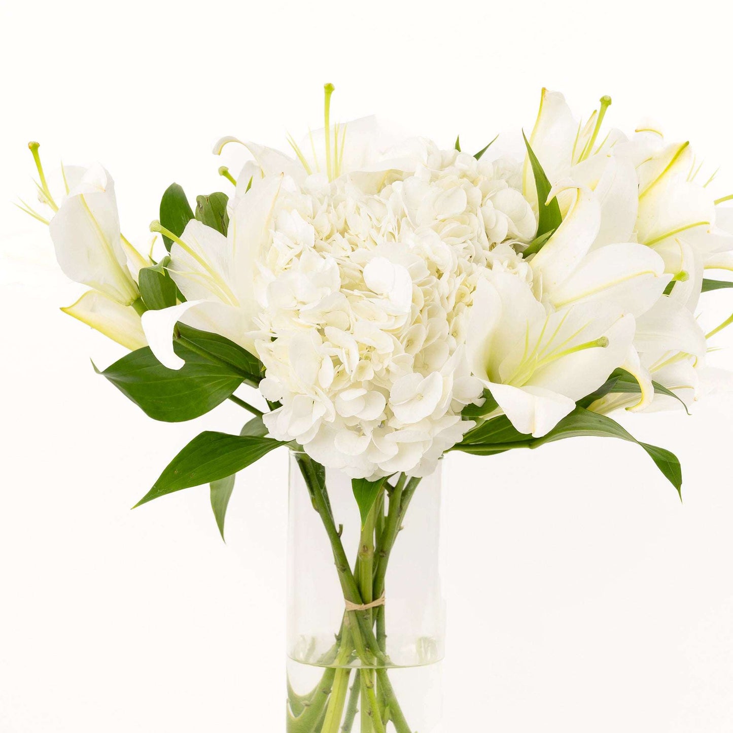 Close-up of white lilies, hydrangea and chrysanthemums in the gratitude bouquet