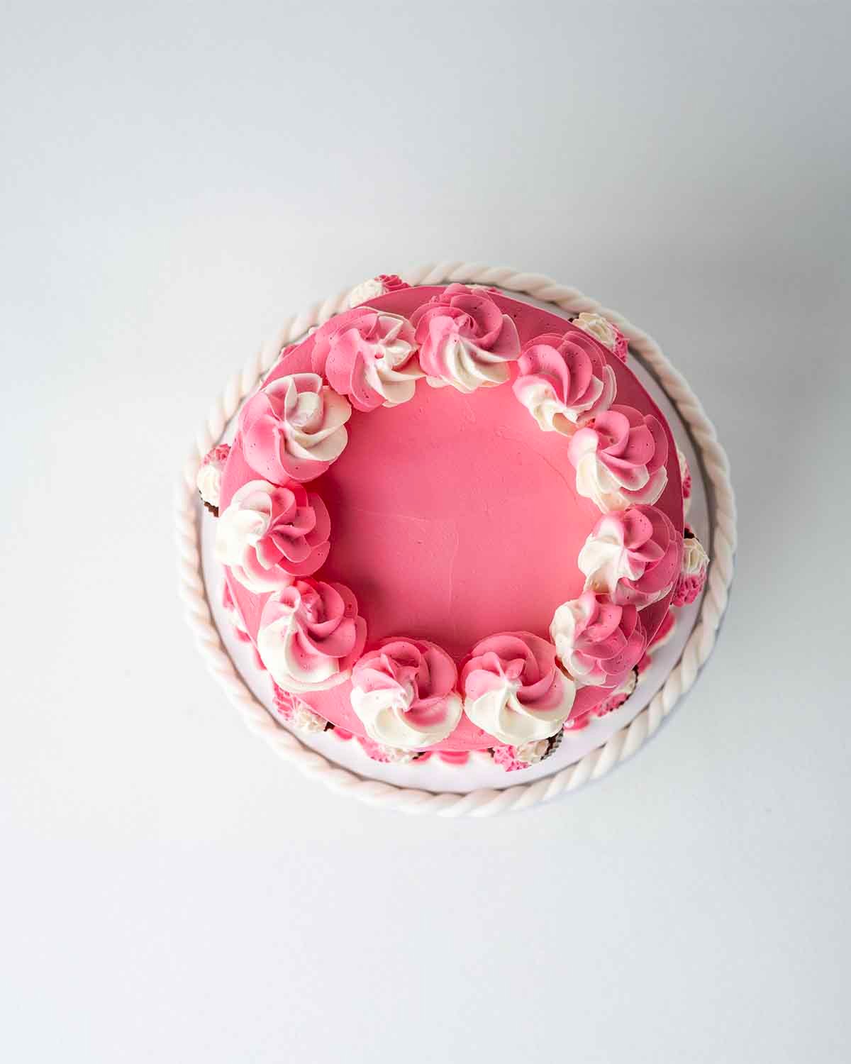1kg Pink Cups and Cream Cake by Cravings Cafe