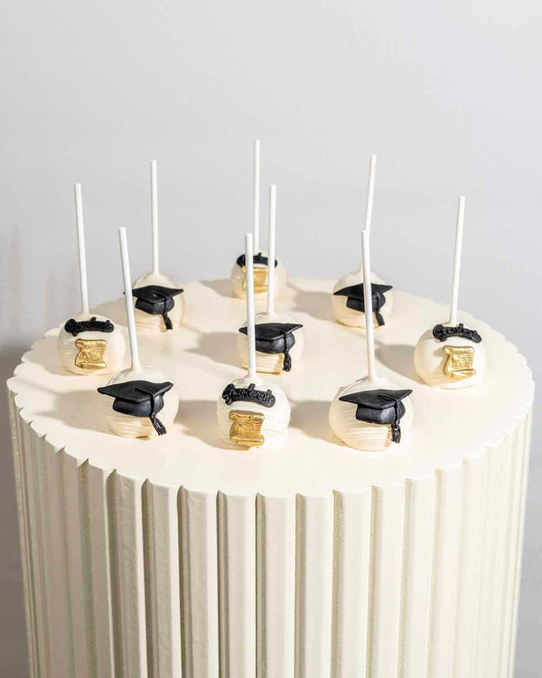 White Chocolate Graduation Cake Pops by NJD