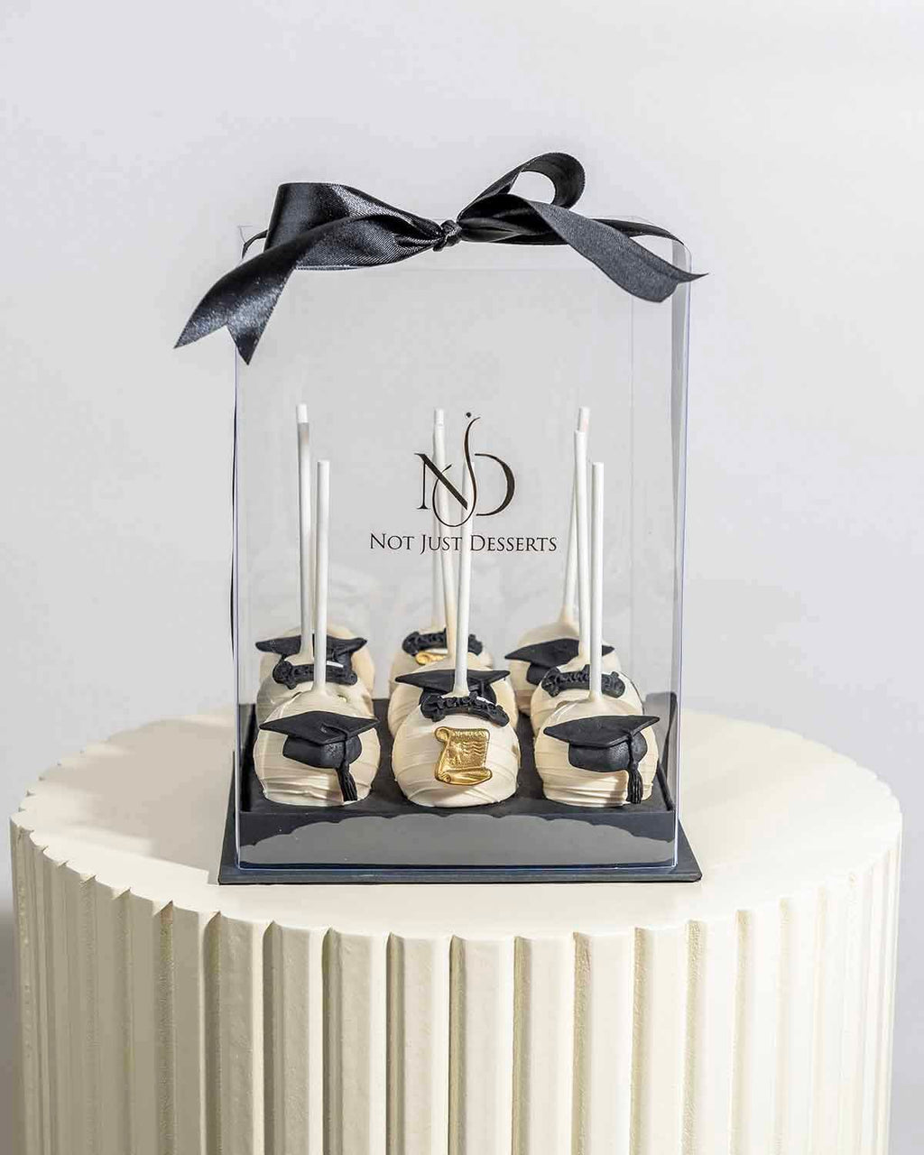 White Chocolate Graduation Cake Pops by NJD