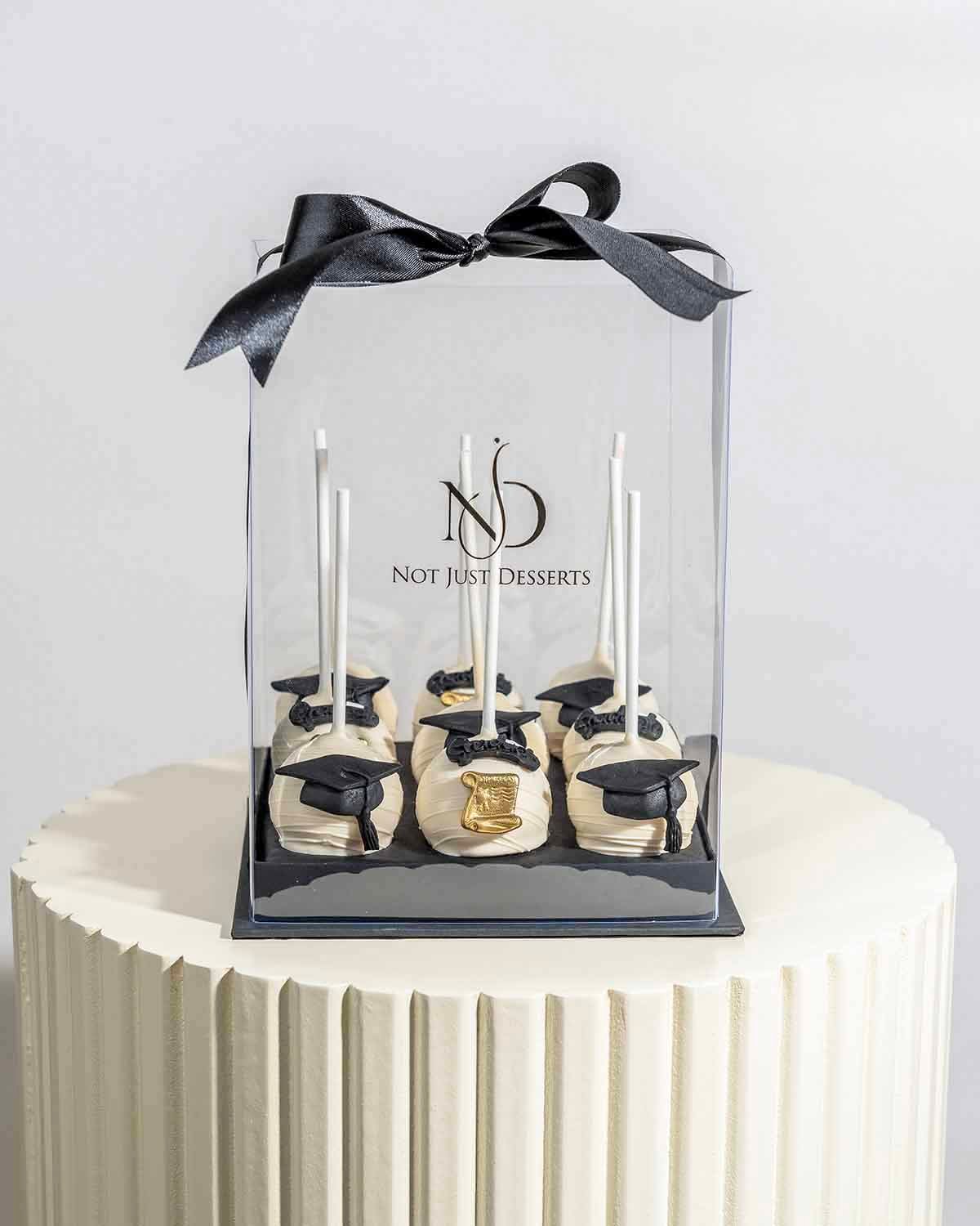 White Chocolate Graduation Cake Pops by NJD