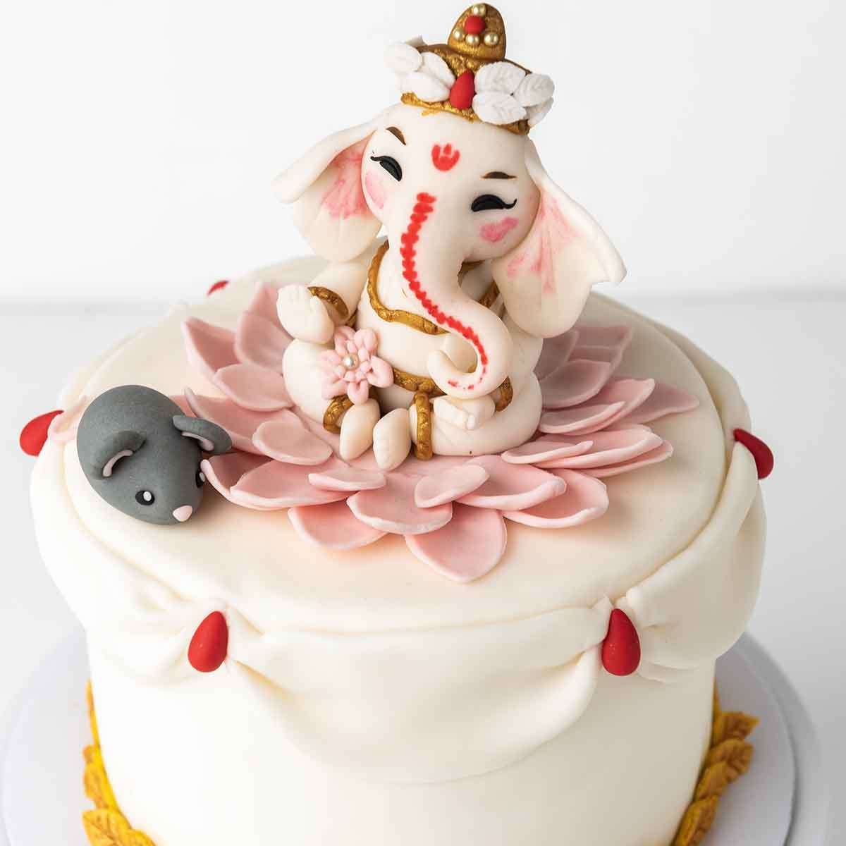 Ganpathi and Mouse Theme Cake by NJD