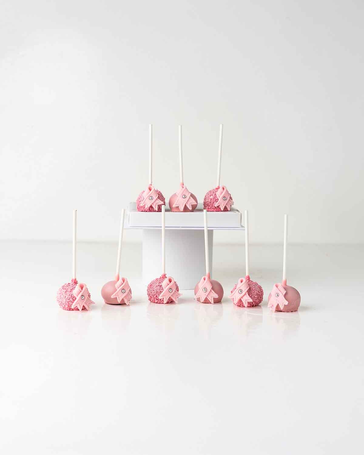 Bow of Hope Cake pops by NJD