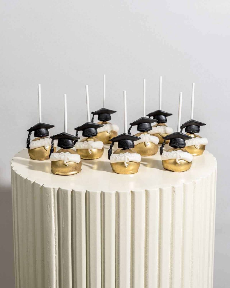 Graduation theme Chocolate Cake pops by NJD